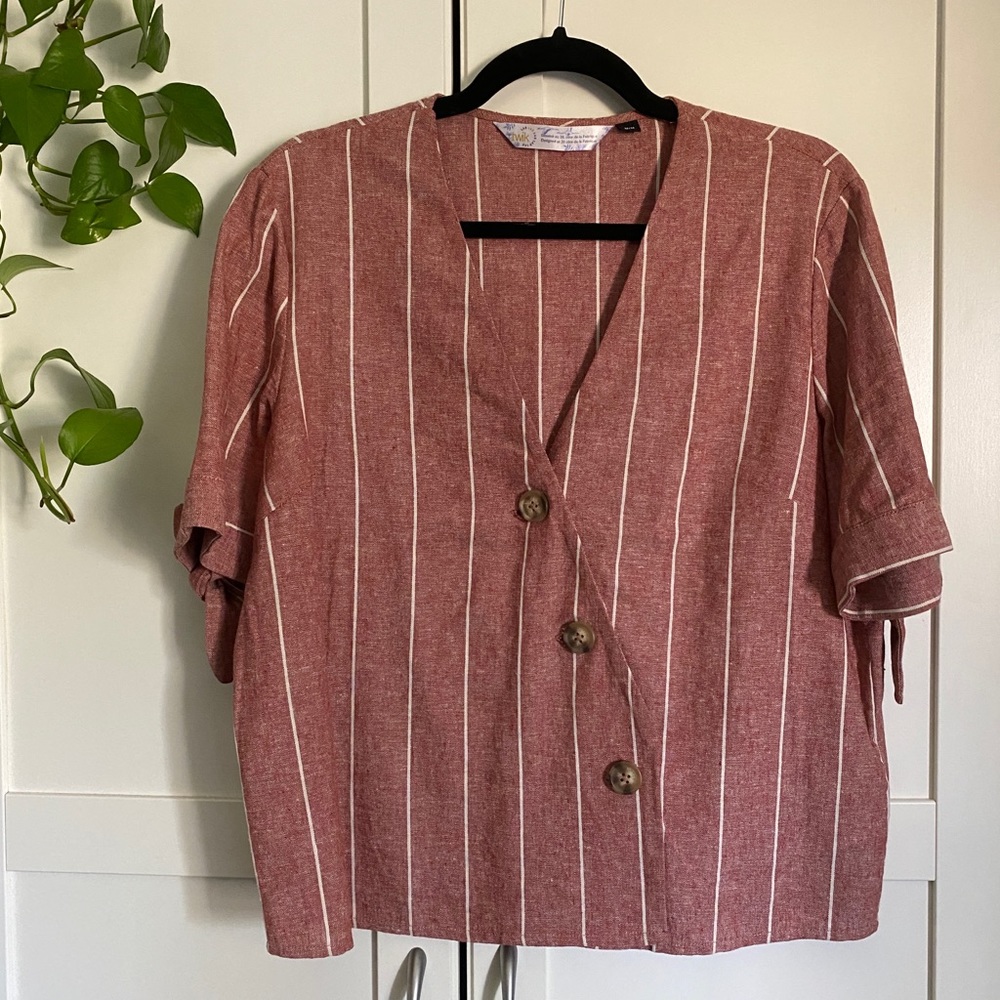 Linen wrap blouse with tortoise-shell buttons